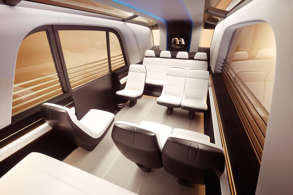 Interior view and leather seats of the Tesla Robovan with accommodation of up to 20 passengers